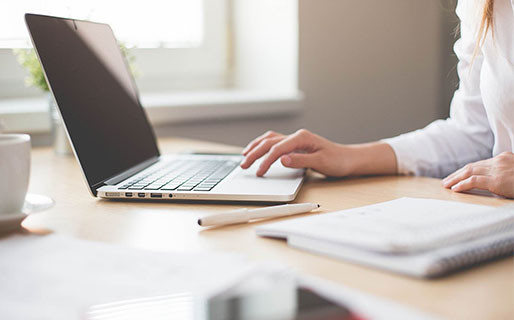 Women working at a laptop